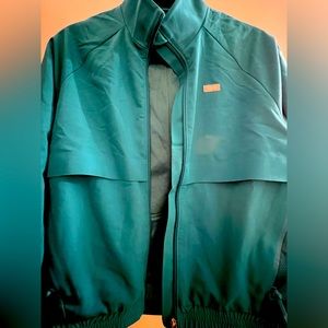 Teal comfy jacket with useful pockets